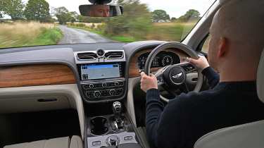 Alex Ingram driving the Bentley Bentayga Atelier Edition